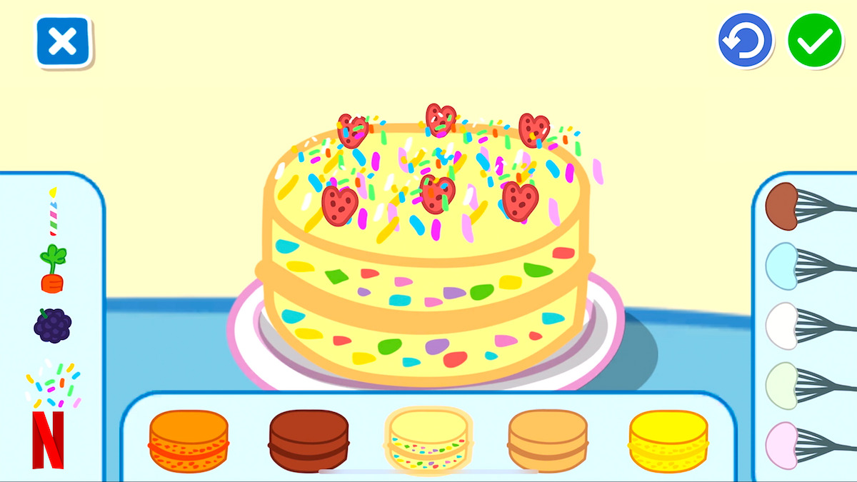 An illustration of a cake-decoration feature in the game.
