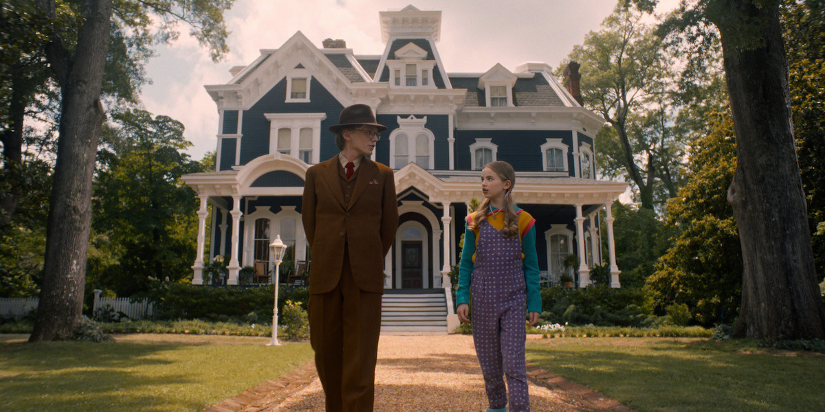 Jamie Campbell Bower as Mr. Whatsit and Nell Fisher as Holly Wheeler in ‘Stranger Things 5’