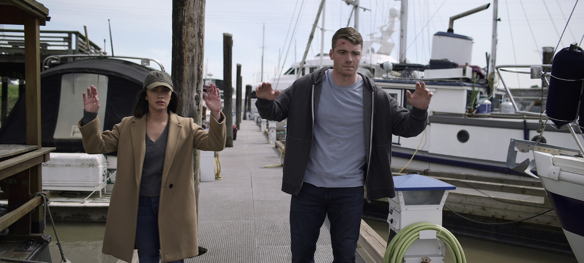 Rose (Luciane Buchanan) and Peter (Gabriel Basso) are on the run in ‘The Night Agent.’