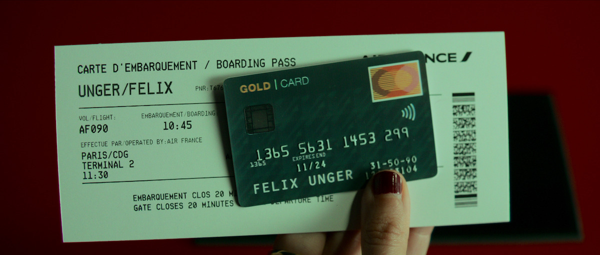 A Paris boarding pass and credit card belonging to a ‘Felix Unger.’