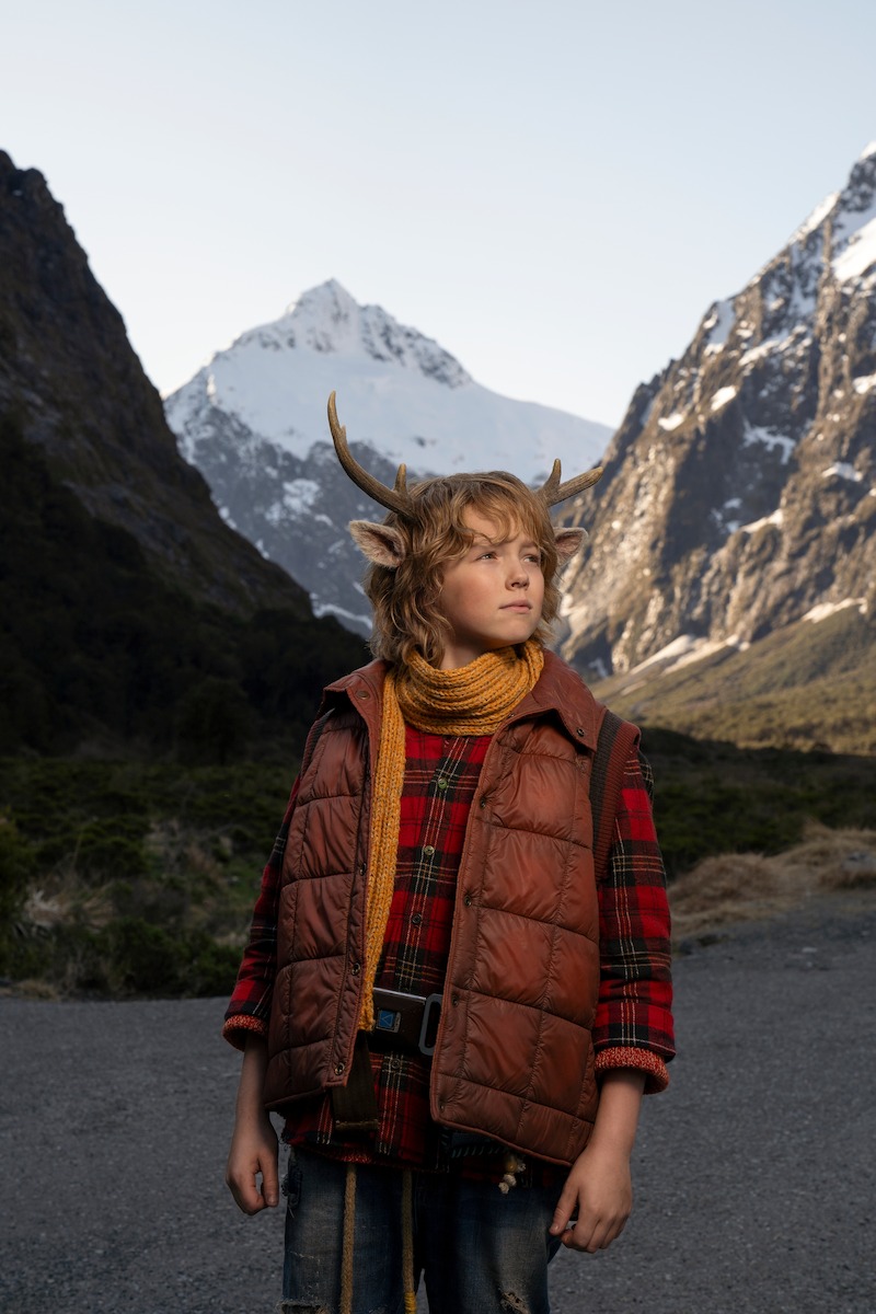 Christian Convery as Gus stands in a mountain range in season 3 of 'Sweet Tooth'
