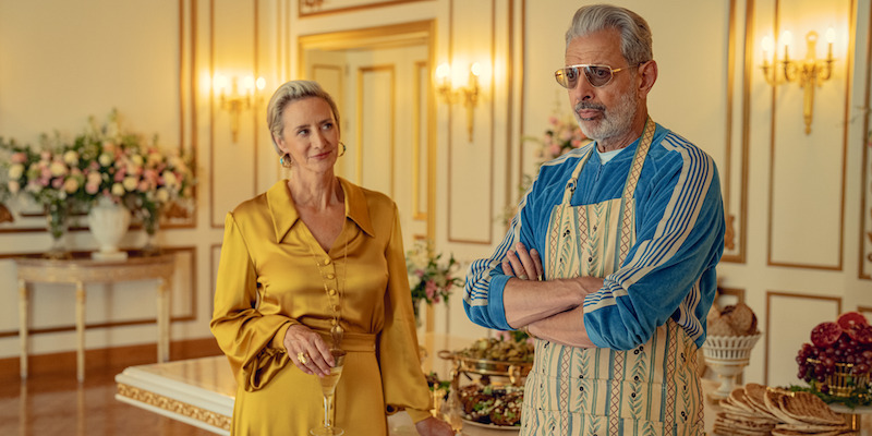 Janet McTeer as Hera stands in an ornate room with Jeff Goldblum as Zeus wearing an apron in 'KAOS'