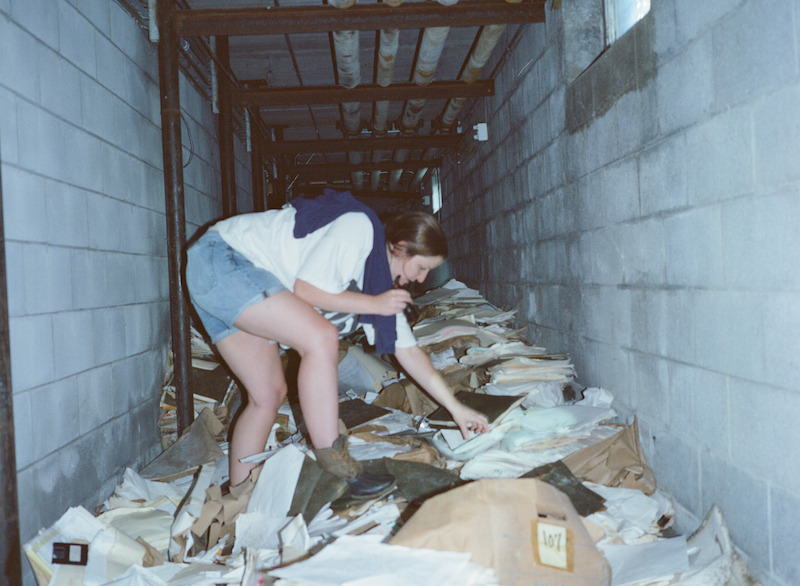 Katherine Kubler exploring abandoned detritus at The Academy at Ivy Ridge.