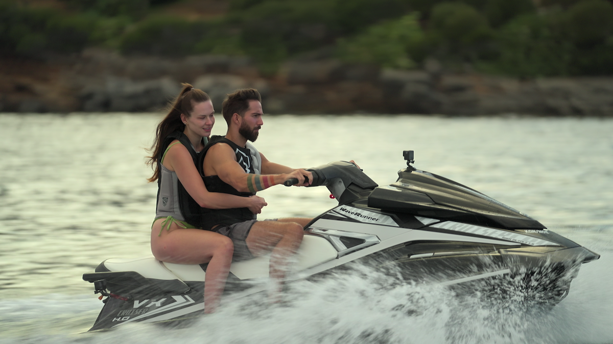 Jen and Marcel on a jet ski.