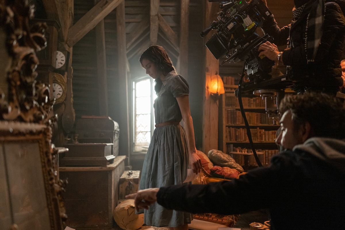 Aria Mia Loberti as Marie-Laure, Director/Executive Producer Shawn Levy in episode 103 of All the Light We Cannot See.