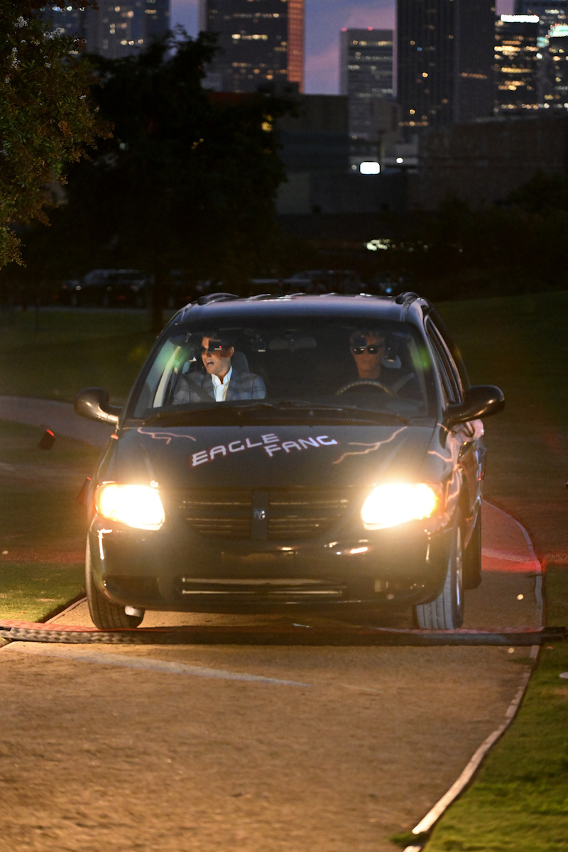 Macchio and Zabka pull up in the Eagle Fang van.