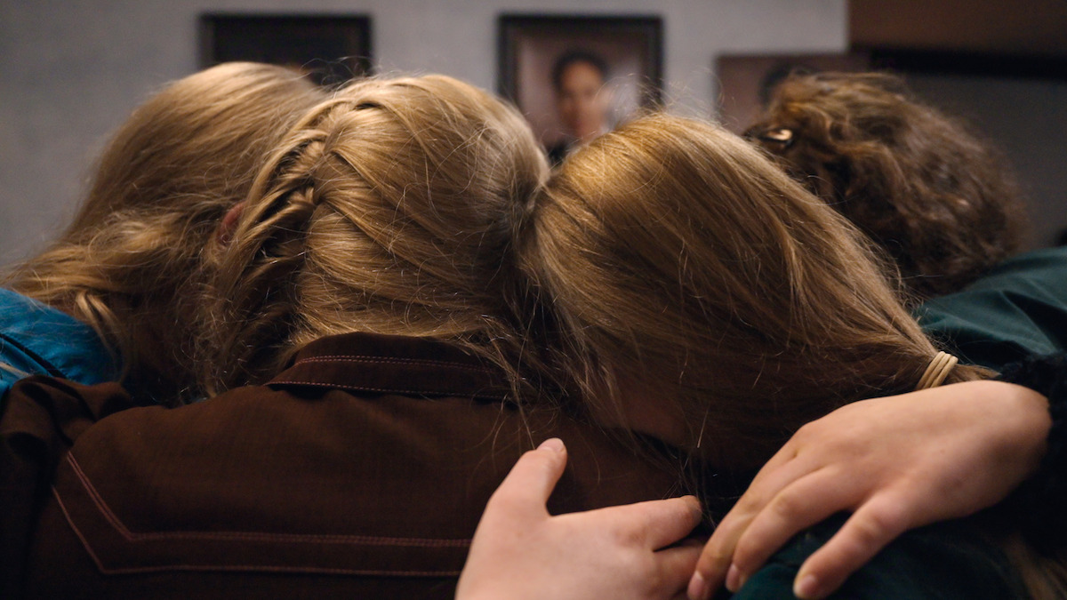 Some of Sam Bateman’s wives huddle together