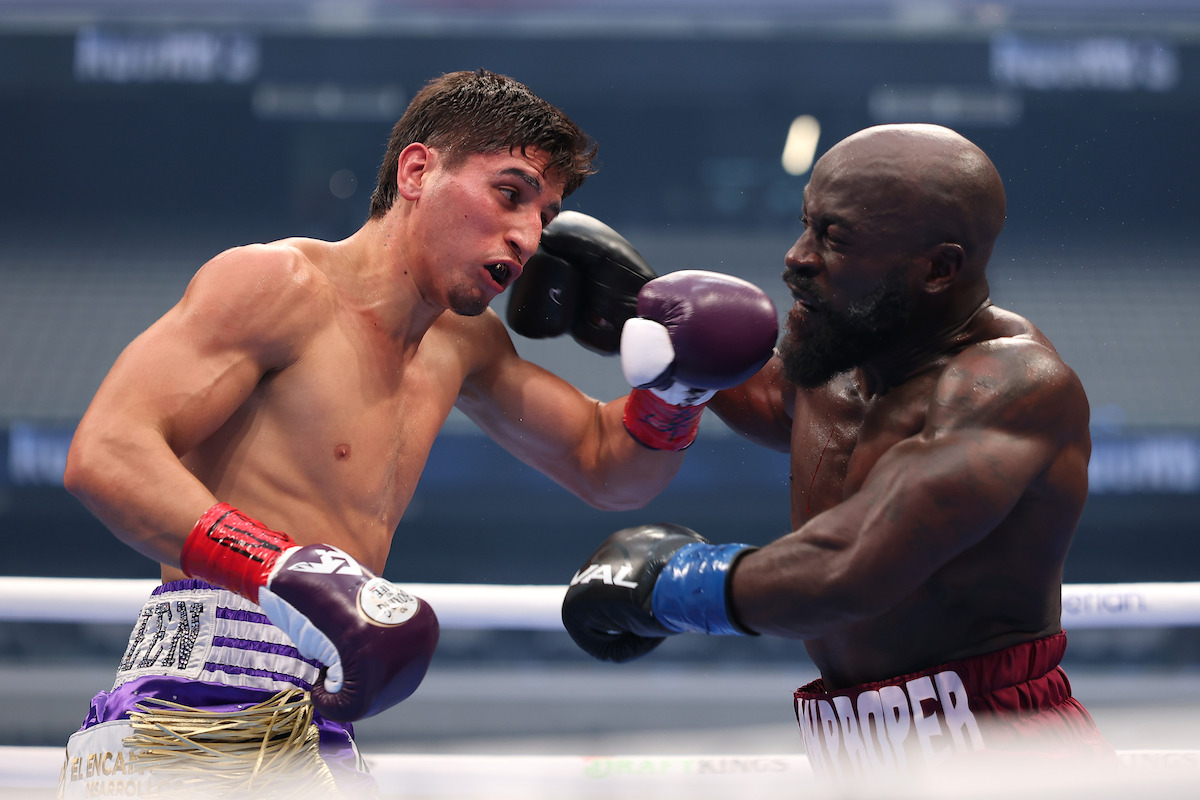 Marco Verde and Sona Akale exchange punches during their super middleweight bout