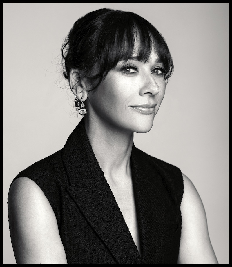 Rashida Jones looks away from the camera as she poses for a photo.