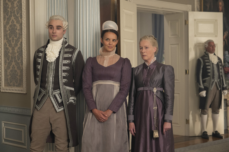 Oli Higginson as Footman John, Sophie Lamont as Celia, and Geraldine Alexander as Mrs. Wilson in 'Bridgerton' Season 4.