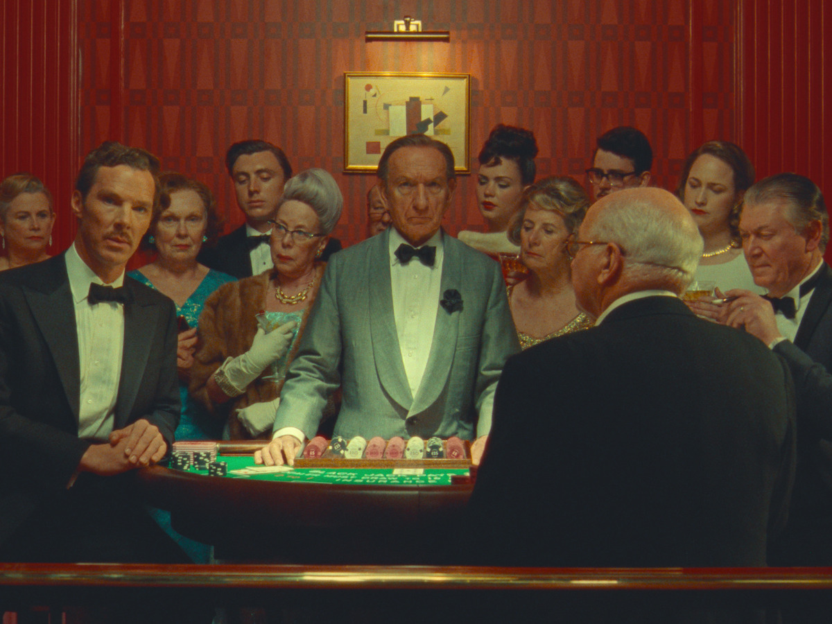 Benedict Cumberbatch as Henry Sugar and Ben Kingsley as The Croupier stand in the casino in ‘The Wonderful Story of Henry Sugar.’