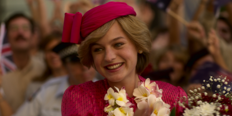 Magenta Hat and Dress Holding flowers