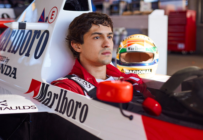 Gabriel Leone as Ayrton Senna sits in a race car in 'Senna'