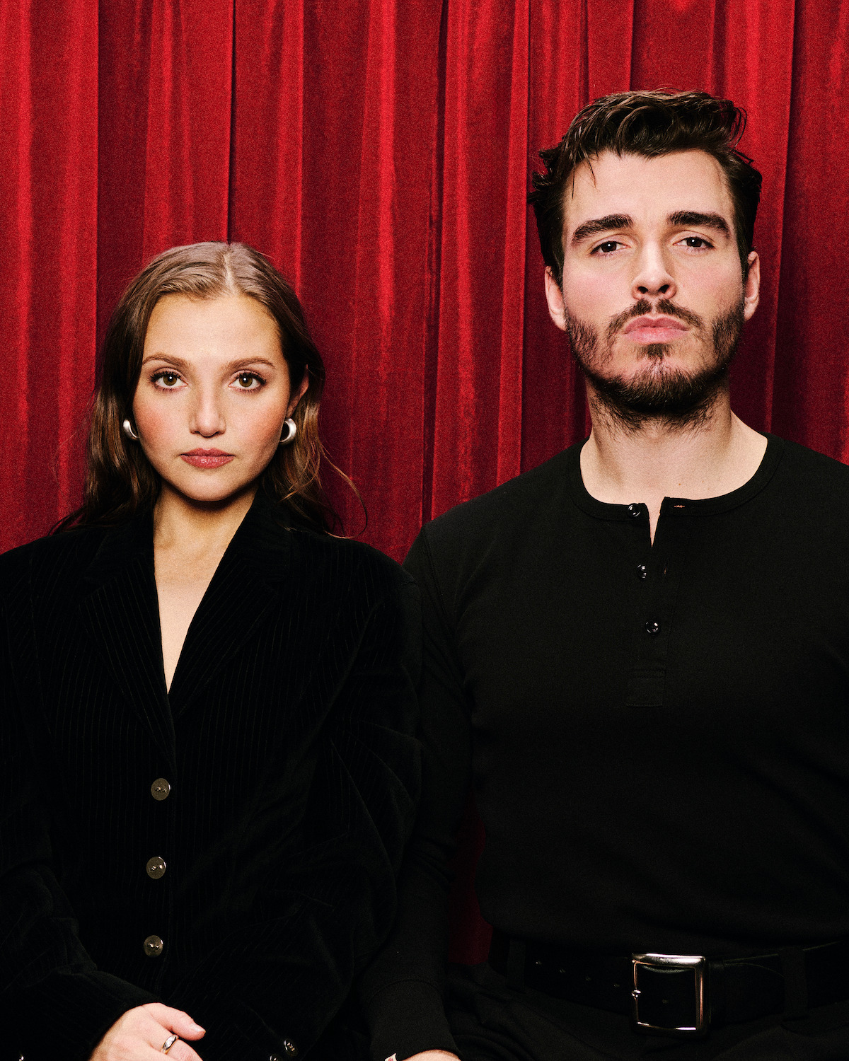 Mia McKenna-Bruce and Corey Mylchreest in a photobooth