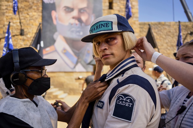 Aidan Scott as Helmeppo in hair and makeup on the set of Season 1 of 'One Piece.'