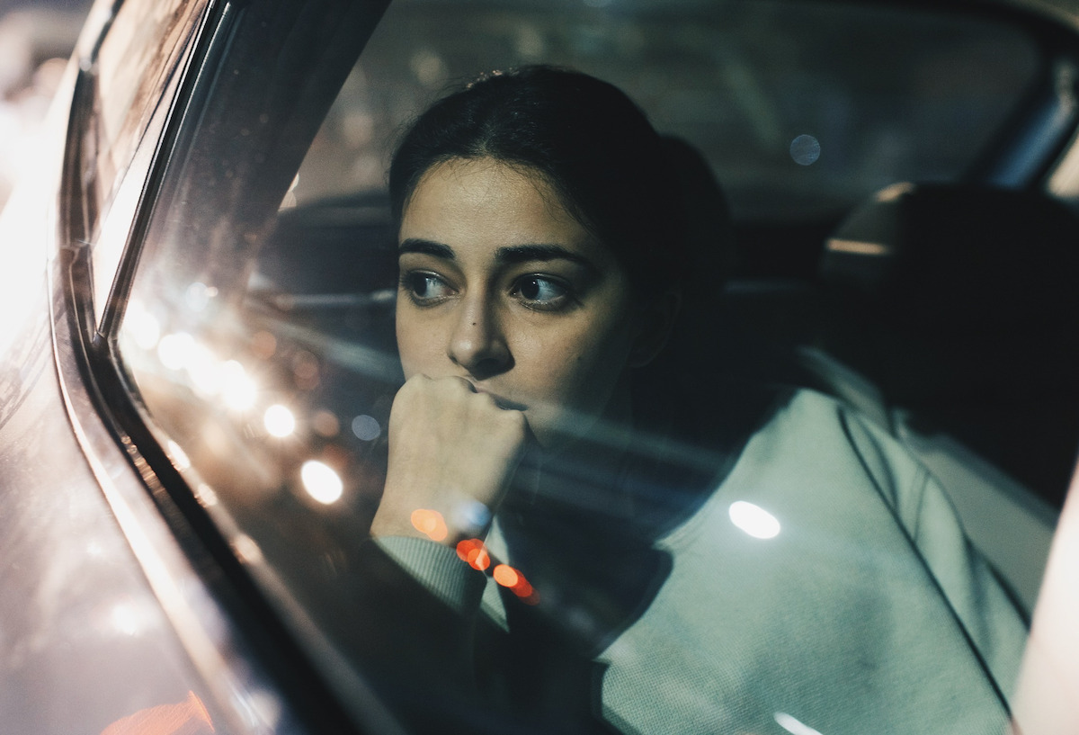 Ananya Panday as Nella Awasthi looks out a car window in an image from the movie ‘CTRL.’