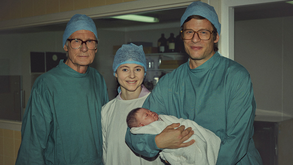Bill Nighy as Patrick Steptoe, Thomasin McKenzie as Jean Purdy, and James Norton as Robert Edwards in ‘Joy’