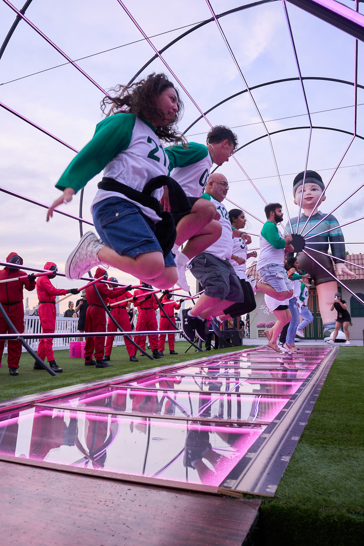 Fans compete during a ‘Squid Game’ Season 3 fan event in Brooklyn, New York.