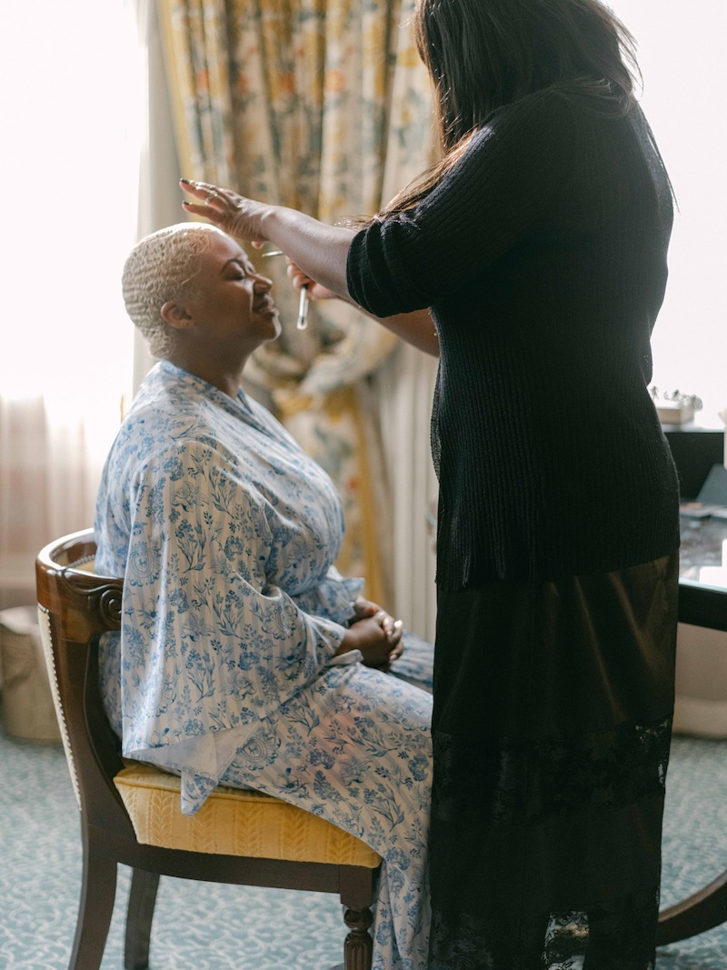 Tiffany Rae get her makeup done in 'The Event of the Season: A Bridgerton Wedding'