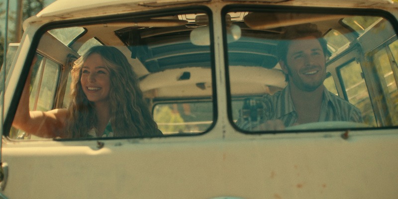 Jessica Rothe as Sarah and Callum Kerr as Everett drive in a vintage van in Season 6 of 'Virgin River'