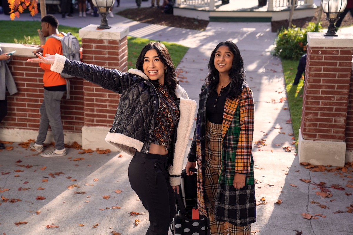 Jade Bender as Jade Kwan and Maitreyi Ramakrishnan as Devi standing outside Princeton in ‘Never Have I Ever’ Season 4.