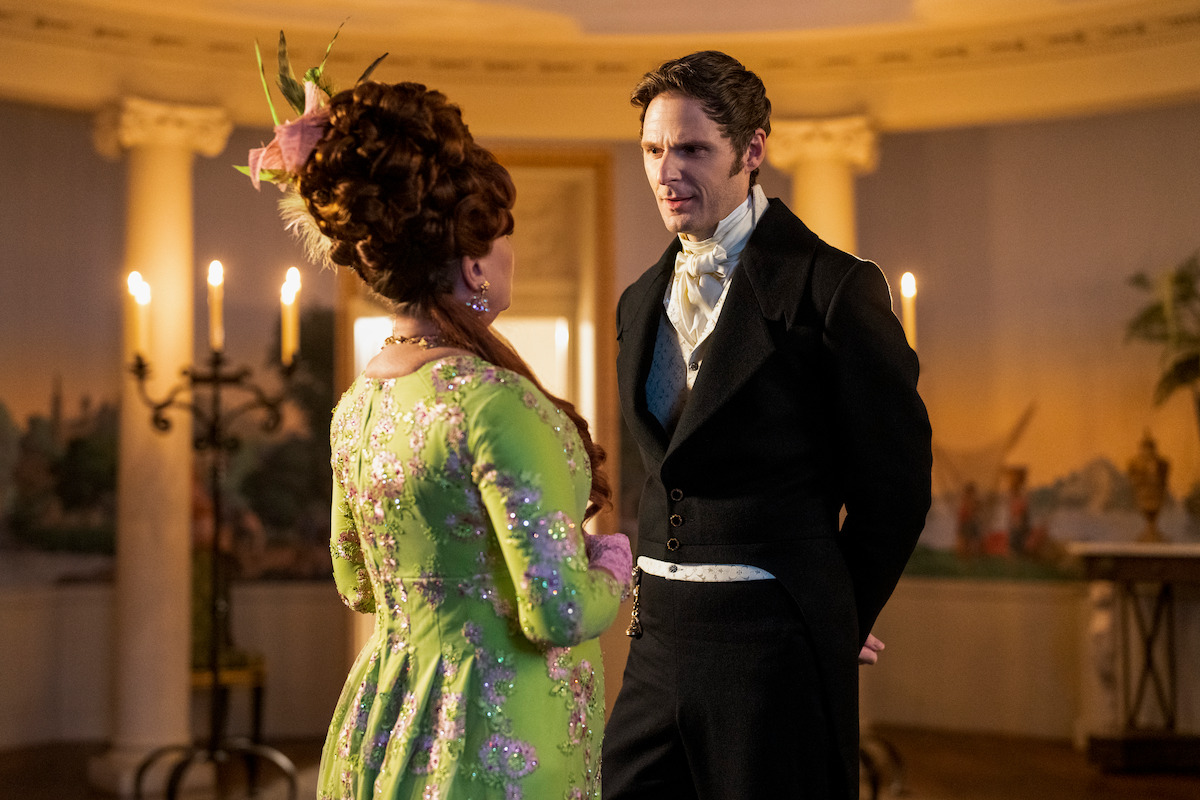 Polly Walker as Lady Portia Featherington stares at Rupert Young as Lord Jack Featherington in Season 2 of ‘Bridgerton.’