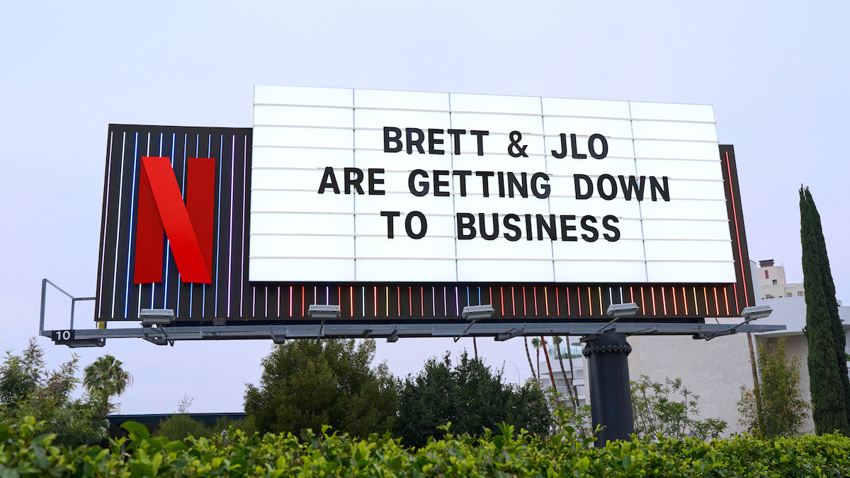 Office Romance Sunset Blvd Marquee ‘Brett & JLo are getting down to business’