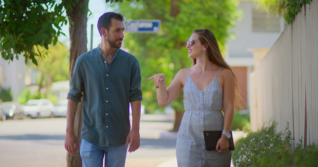 Ori Basly walks with his date. 