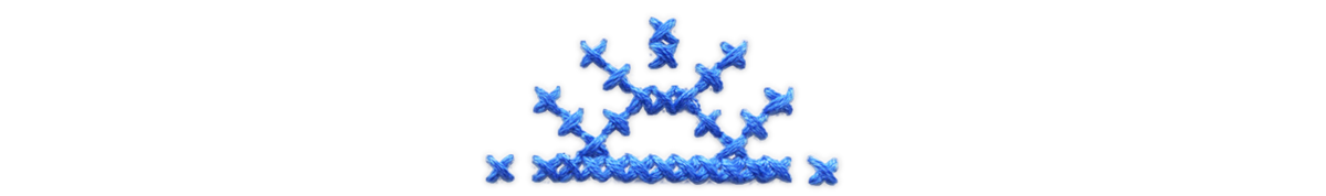 Blue cross stitched sun.