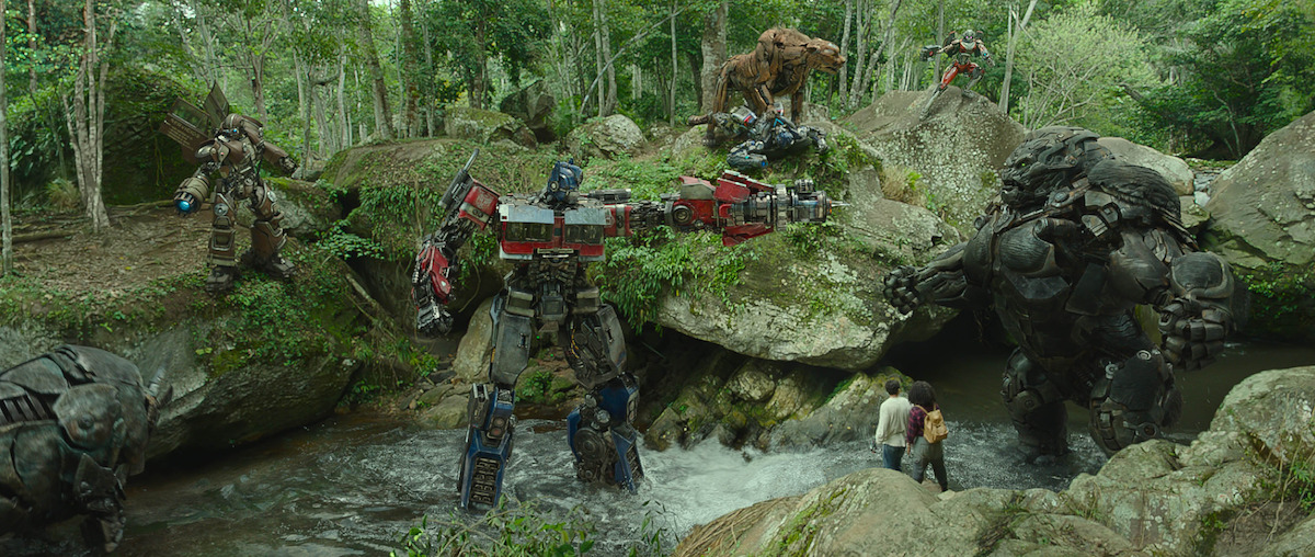 Noah (Anthony Ramos), Elena (Dominique Fishback) and some of the Autobots in ‘Transformers: Rise of the Beasts.’