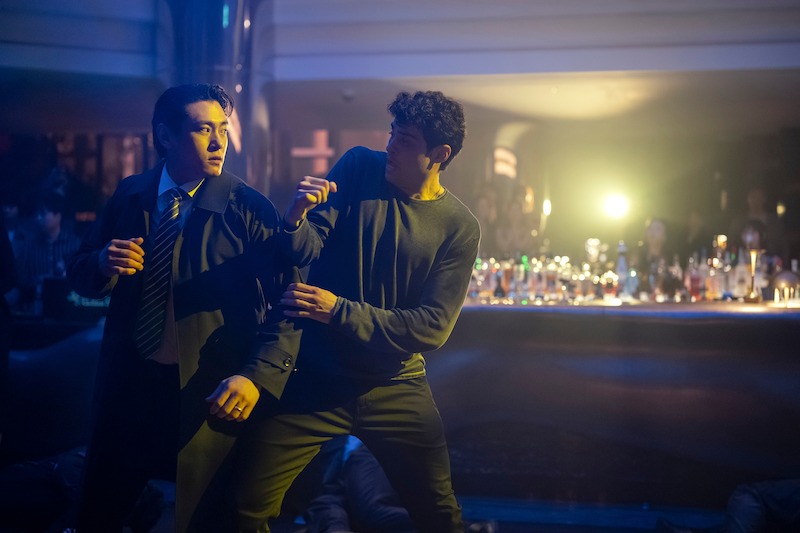 Teo Yoo as Jang Kyun Kim and Noah Centineo as Owen Hendricks in Season 2 of 'The Recruit'