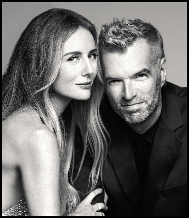 Justine Lupe and Timothy Simons pose with their faces close together.