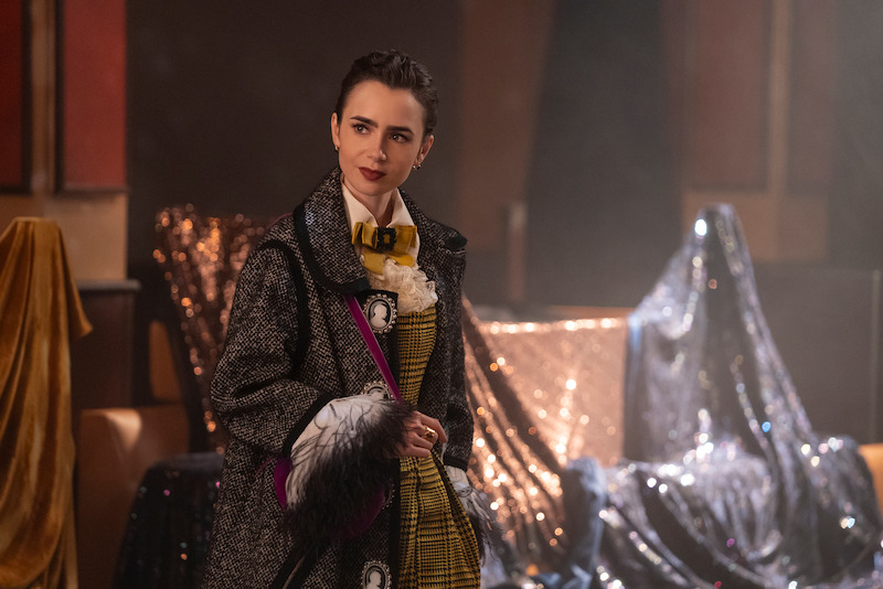 Lily Collins as Emily wears a yellow plaid outfit in Season 4 of 'Emily in Paris'