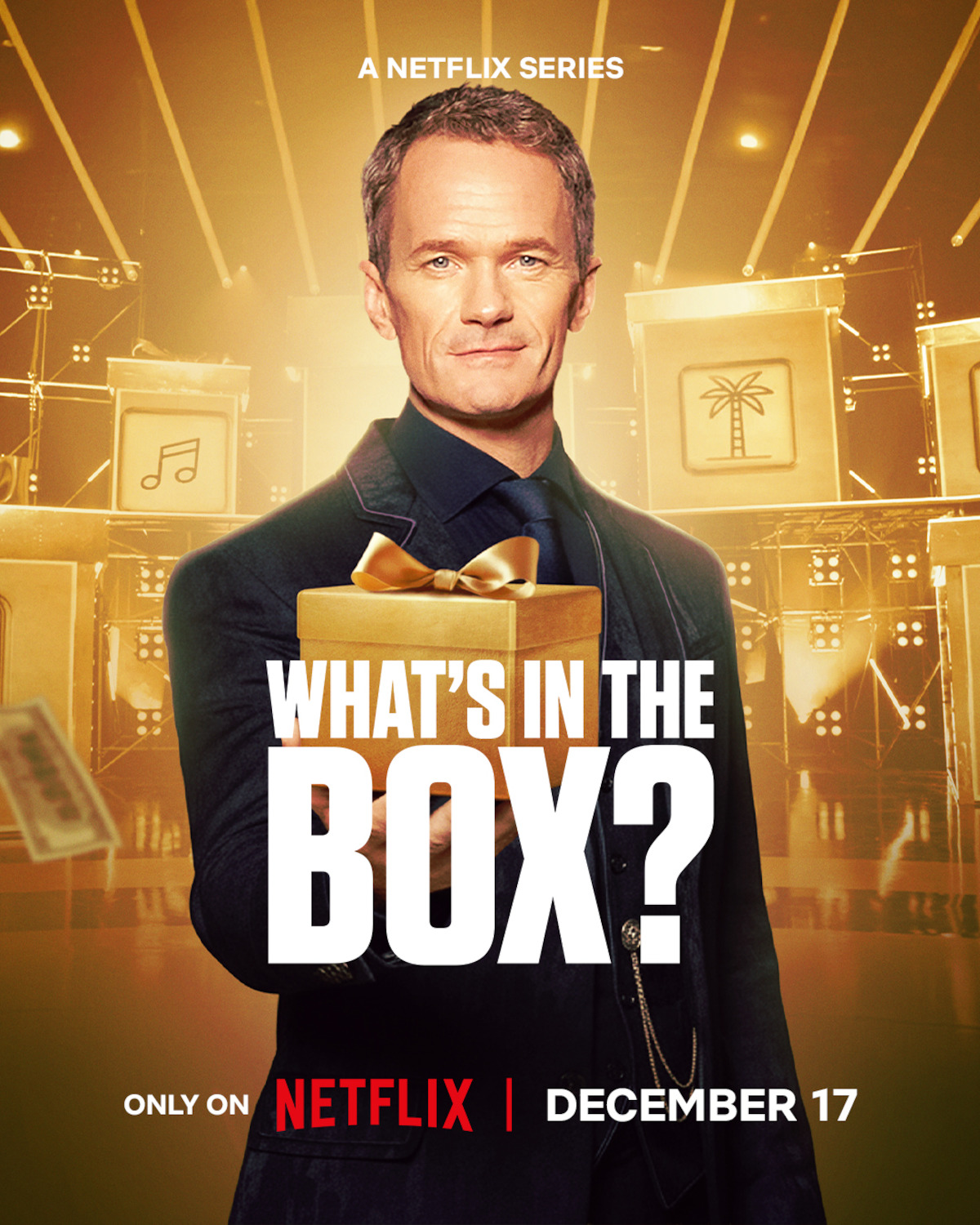 Neil Patrick Harris holds box.