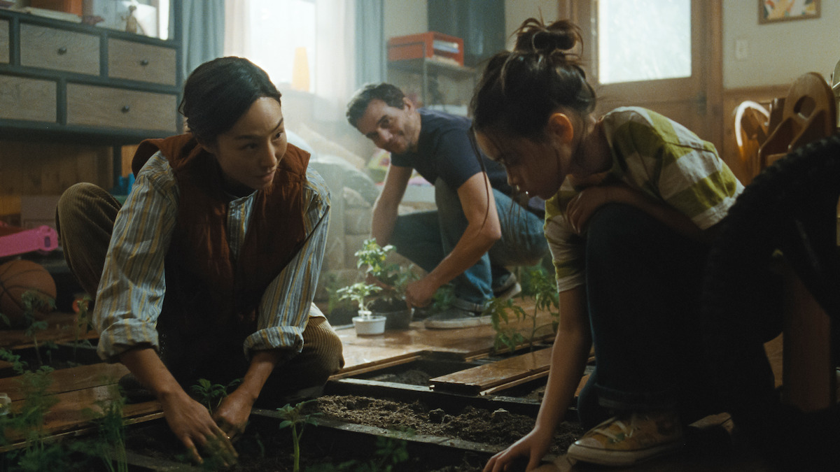 Greta Lee as Ann, Riley Chung as Ruth and Wagner Moura as Jason in ‘The Last House’