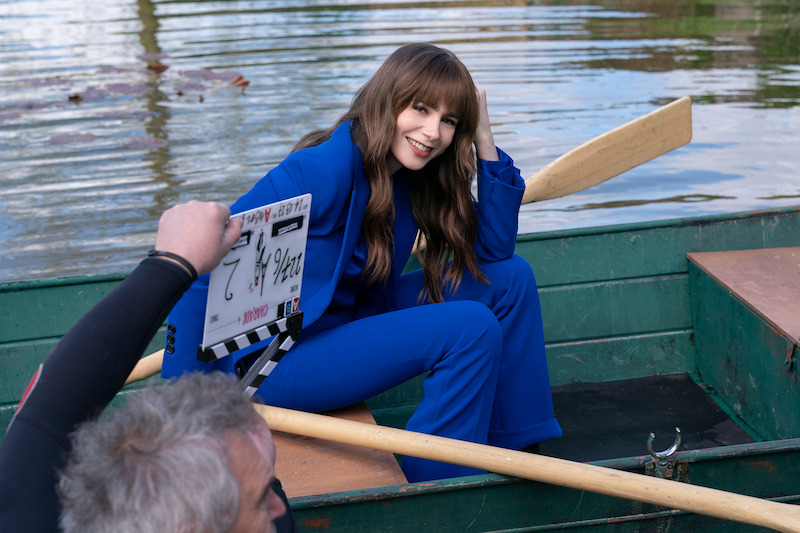 Behind the scenes shot of Lily Colins as Emily in Season 4 of 'Emily in Paris'