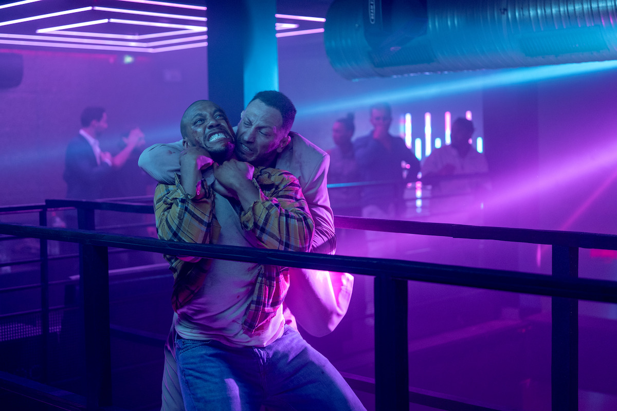 Two men fight in a nightclub