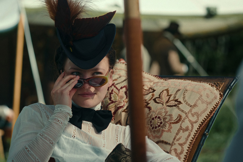 It takes a special person to pull off a feathered hat, bow tie and tortoiseshell sunglasses and still look chic.