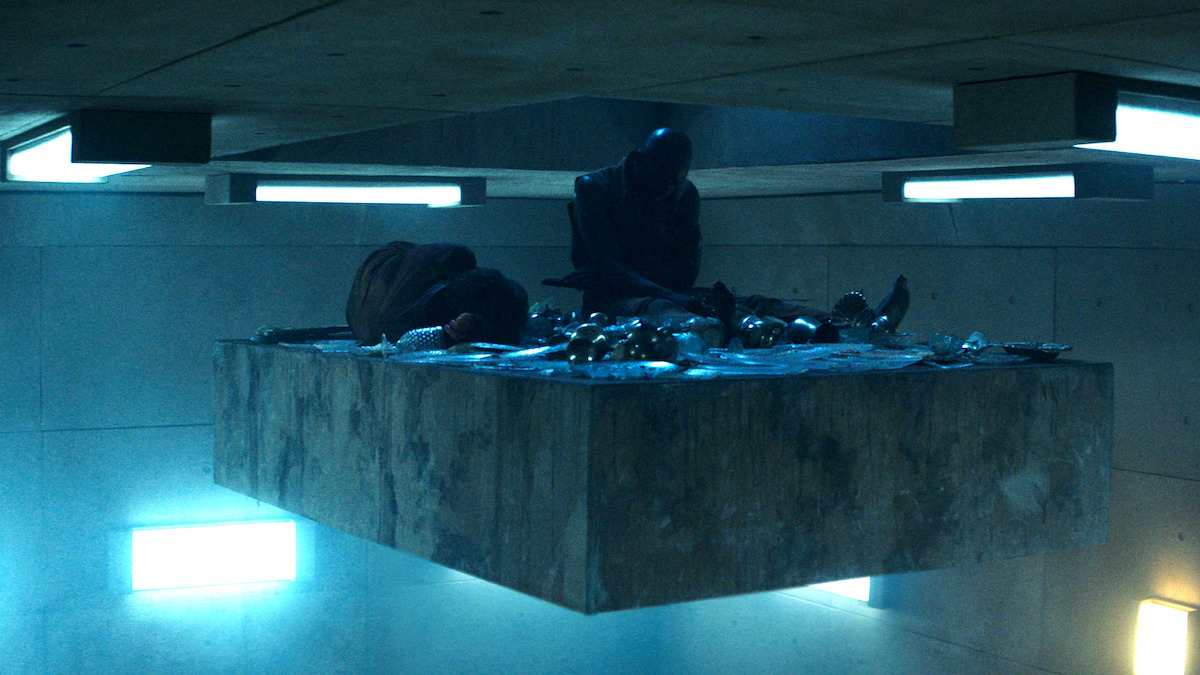 Prison inmates are fed on a descending platform in the dystopian thriller 'The Platform'