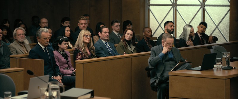 A courtroom scene featuring the cast of The Fall of the House of Usher