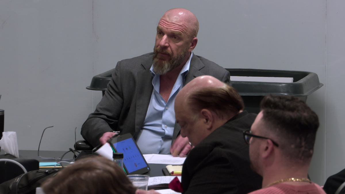 Triple H during a meeting.