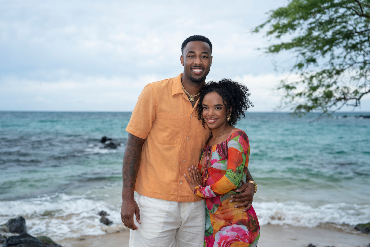 Brion and Shanté stand on the beach