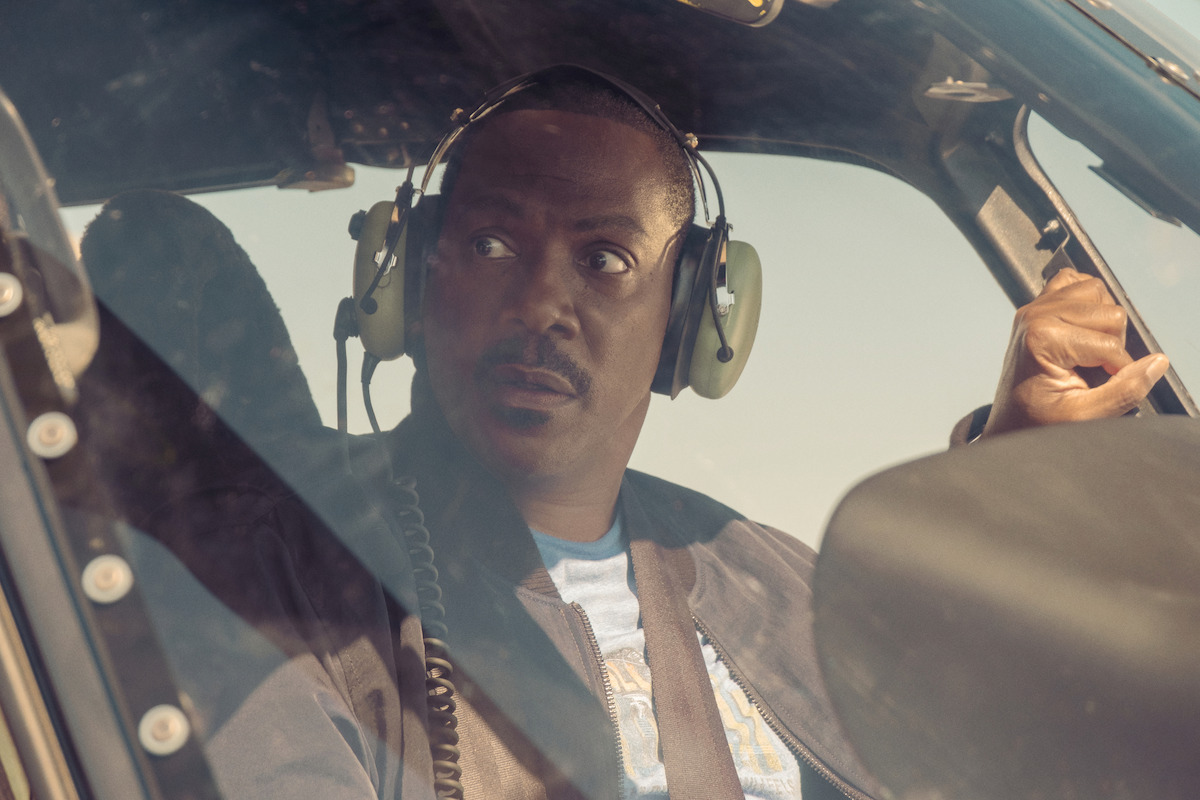 Eddie Murphy as Axel Foley rides in a helicopter in ‘Beverly Hills Cop: Axel F.’