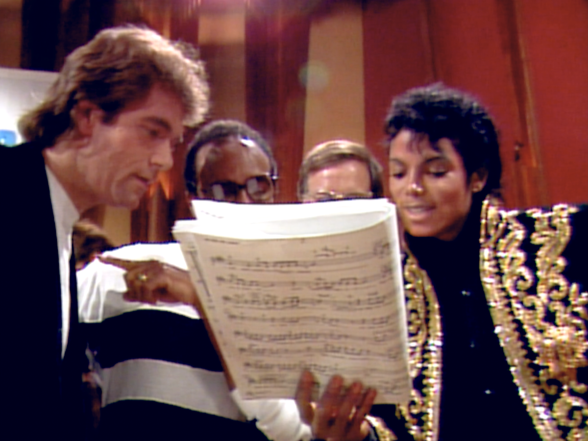 Huey Lewis, Quincy Jones, and Michael Jackson.