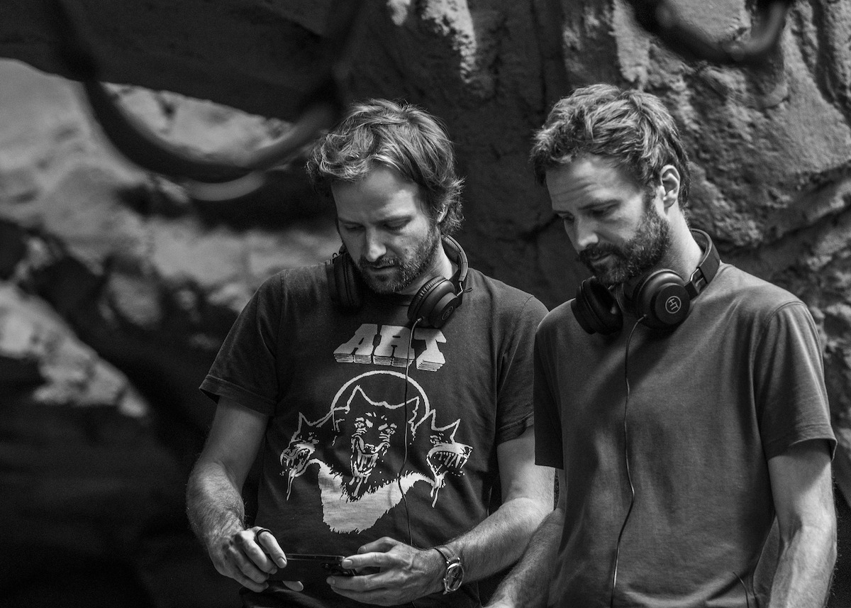 STRANGER THINGS: SEASON 5. (L to R) Director/Writer/Producer Matt Duffer and Director/Writer/Producer Ross Duffer behind the scenes of Stranger Things: Season 5.