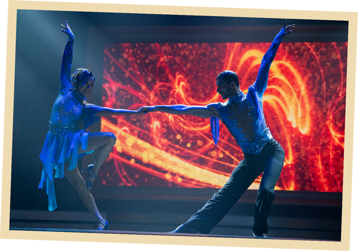 Ashley Park as Mindy and Paolo Busti as Orlando in ‘Emily in Paris’ Season 5.