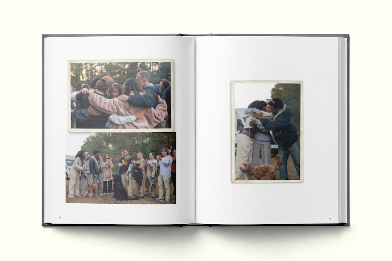 An open photo album with images of a group of people embracing outdoors, another group photo in a park, and two people hugging near a car with a dog, all in a warm, natural setting.