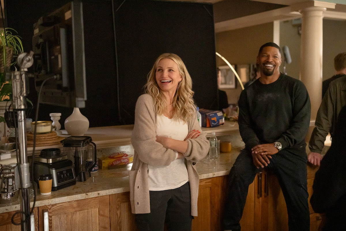 Cameron Diaz as Emily and Jamie Foxx as Matt with crew members on the set of 'Back In Action.'