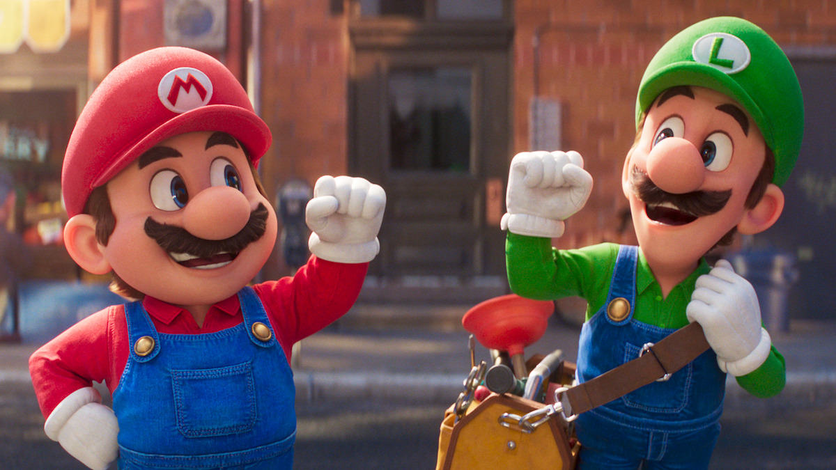 Mario and Luigi raise their fists together in ‘The Super Mario Bros. Movie’