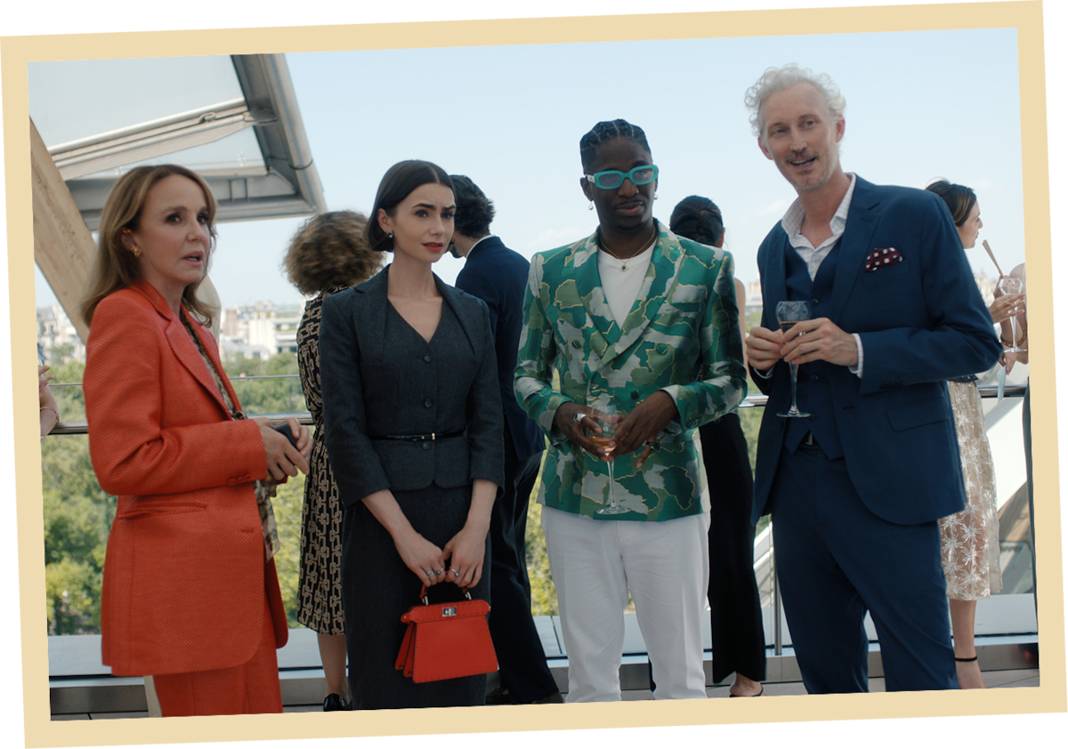 Philippine Leroy-Beaulieu as Sylvie Grateau, Lily Collins as Emily, Samuel Arnold as Julien and Bruno Gouery as Luc in ‘Emily in Paris’ Season 5.